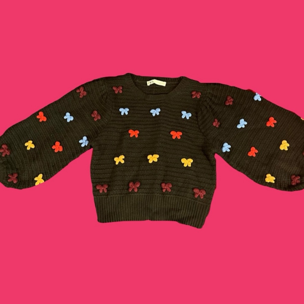 Black and multicoloured knitted jumper with bows